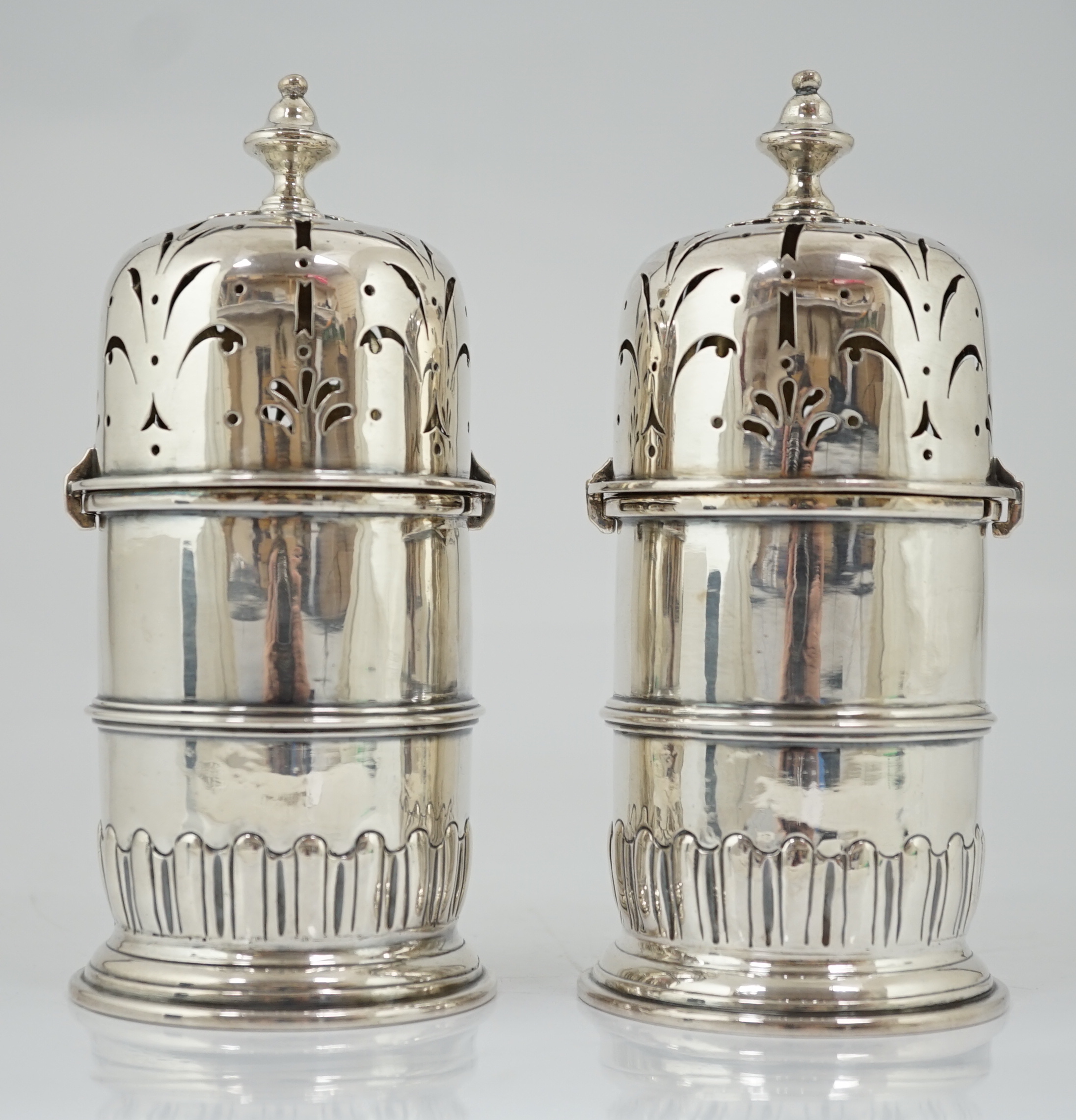 A good pair of late George I silver lighthouse casters, by William Spackman